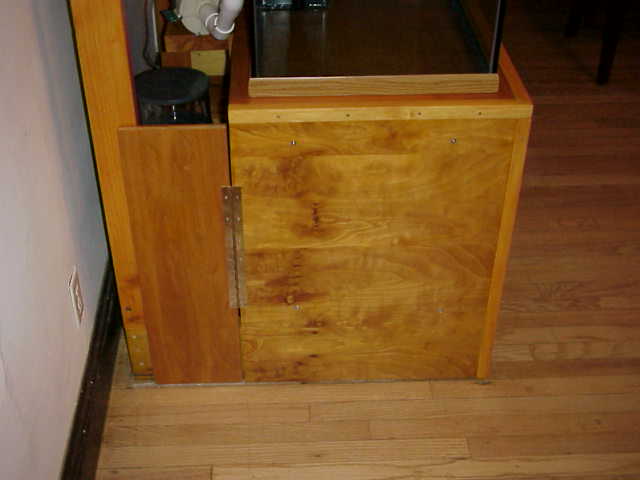 Side of stand with access door.