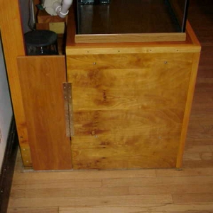 Side of stand with access door.